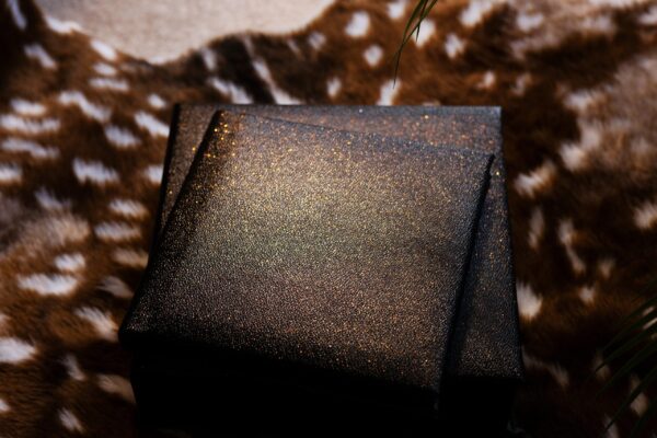 A22A2384 8x8 inch boudoir album with gilding with matching boutique box included in luxury boudoir Photography Experience in Michigan